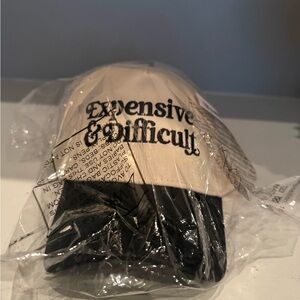 Black and Cream Cap with Embroidered Text